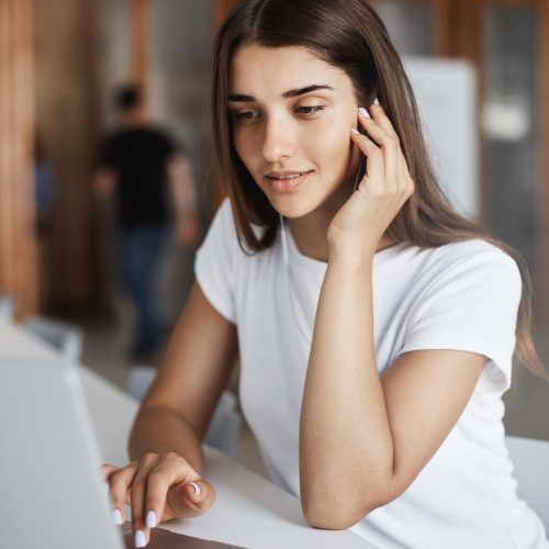 portrait-beautiful-lady-using-laptop-computer-search-internet-new-articles-knowledge-sitting-bright-coworking-space